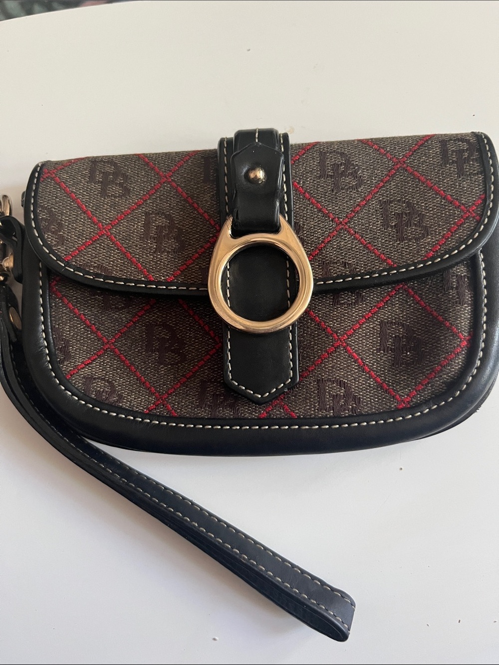 Dooney & Bourke Black and Brown Quilted Wristlet with Red Accents